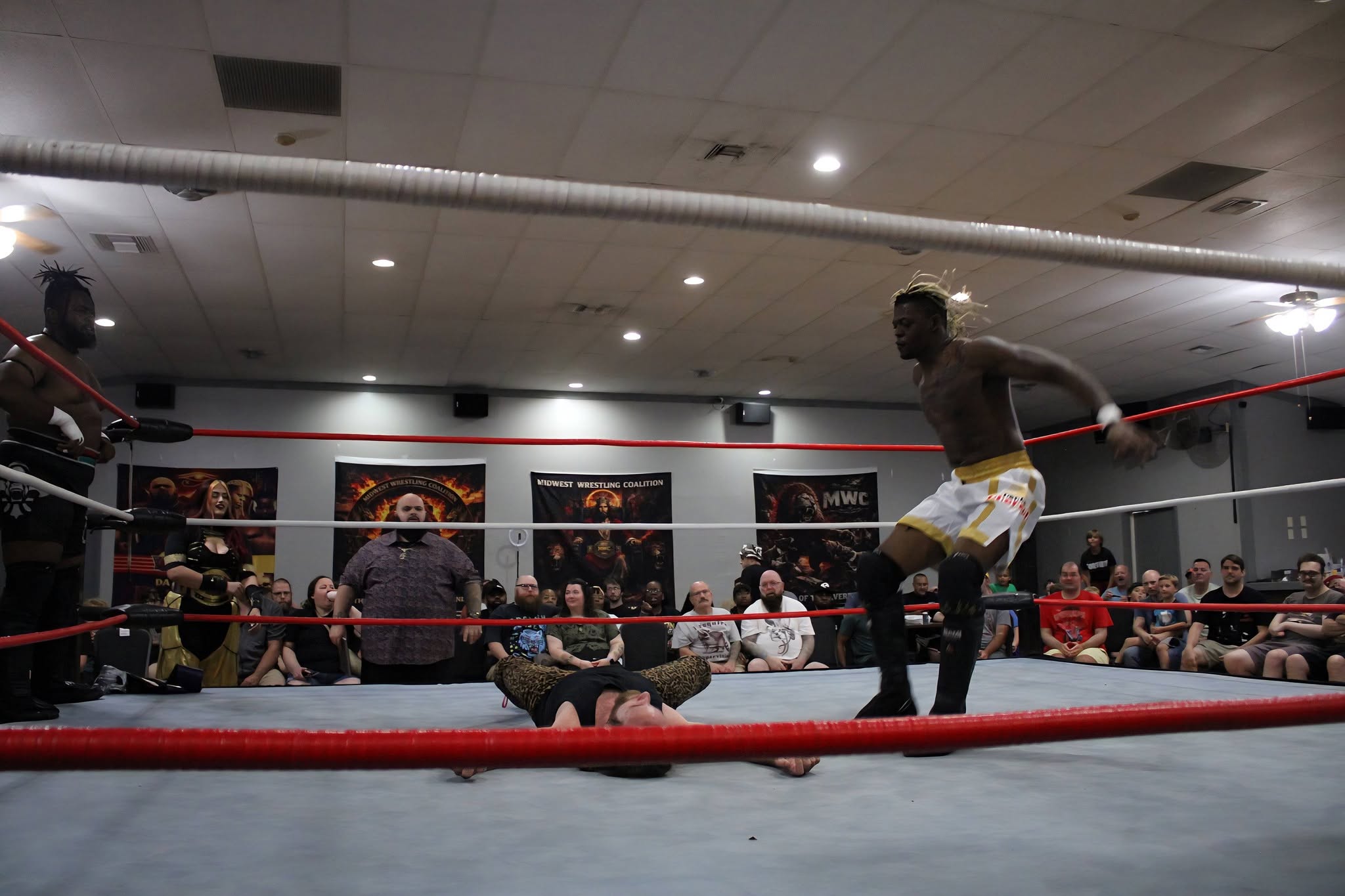 MWC wrestlers competing during the Tag Team Championship match