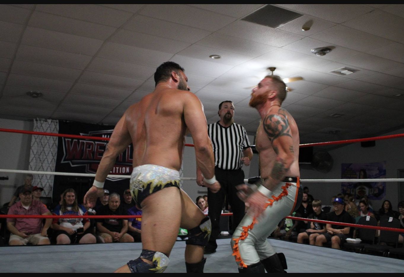 Joey O'Riley and Matty Ice exchanging strikes in the ring