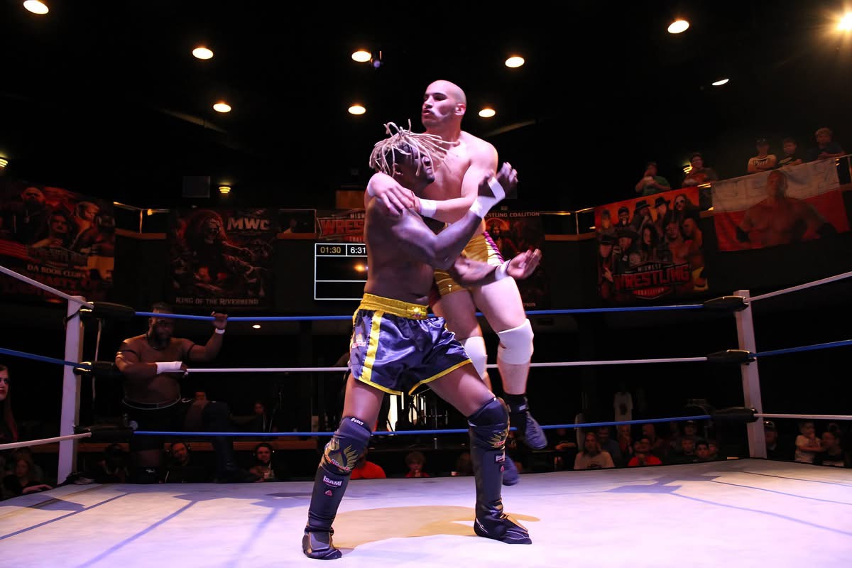 Luke Anthony battles for position in the ring.