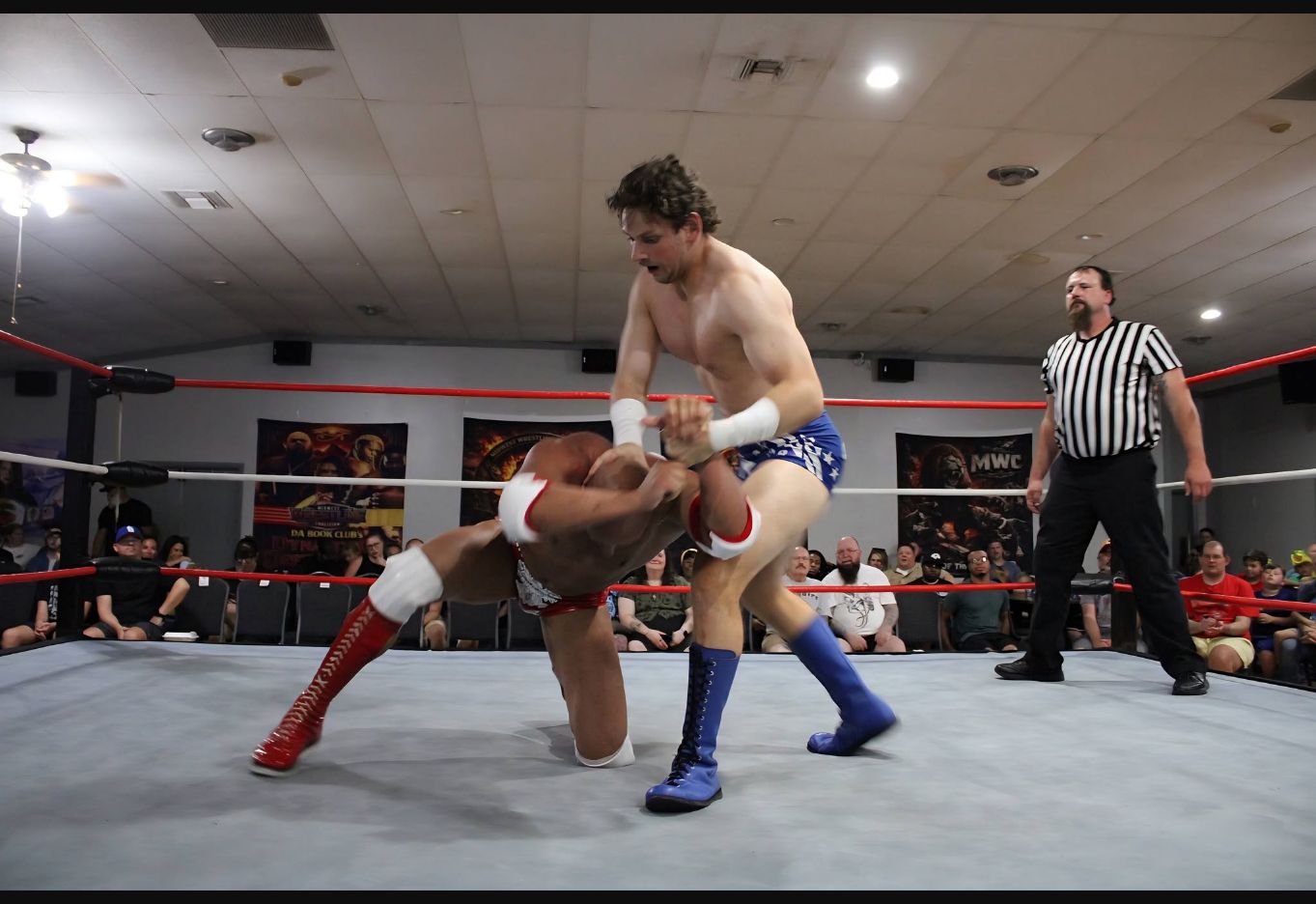 Mario Pardua and Hans Carden exchanging a takedown during the MWC Heavyweight Championship match