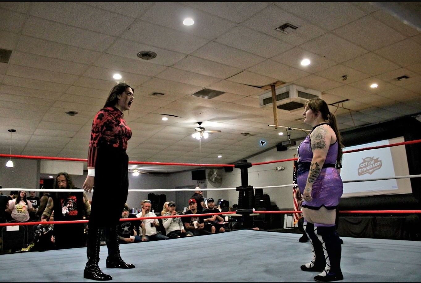 Lillith Khan and Ashlyn Alexander facing one another in the ring