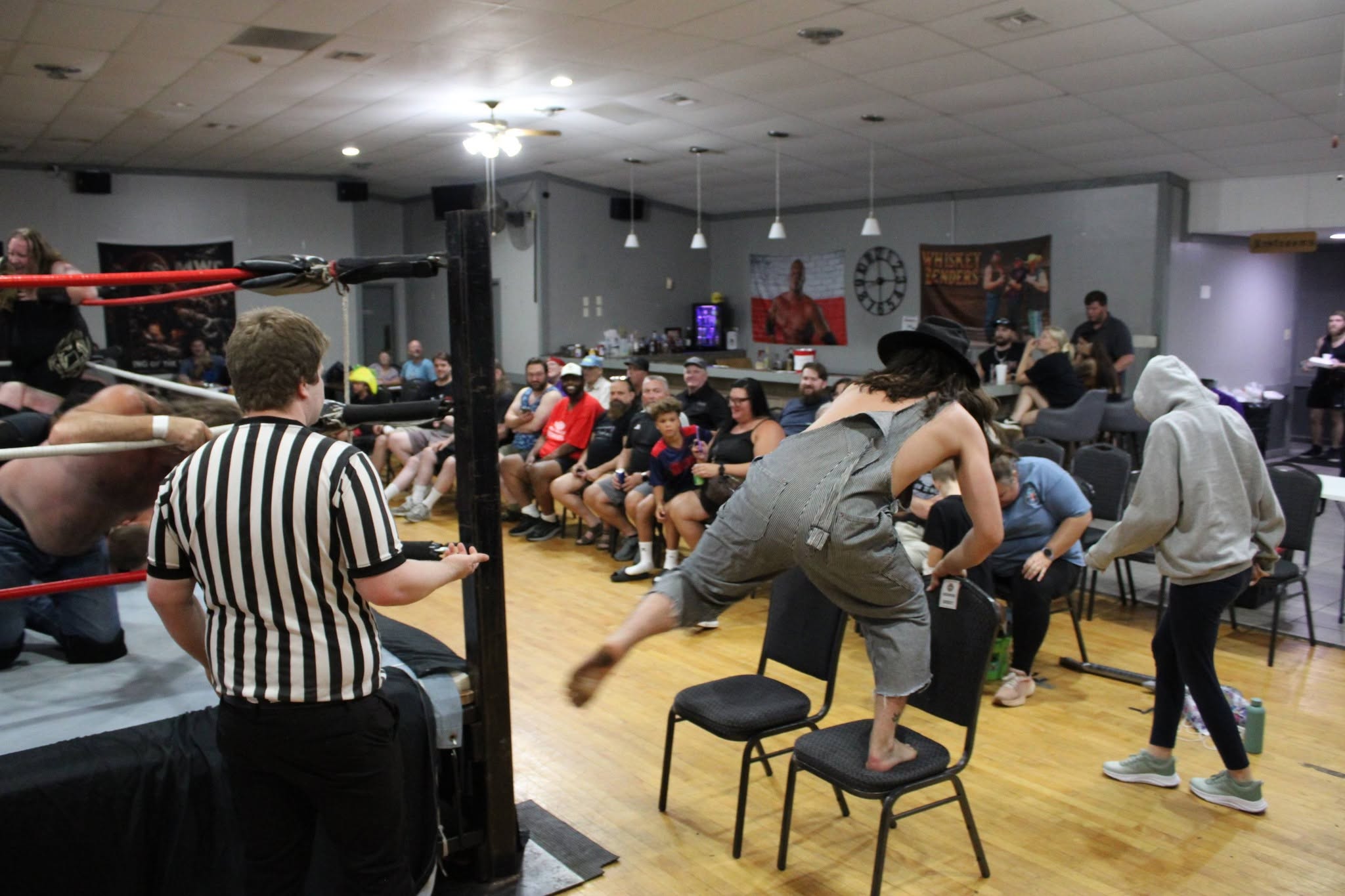 Riverbend Rumble action continuing beside the ringside crowd