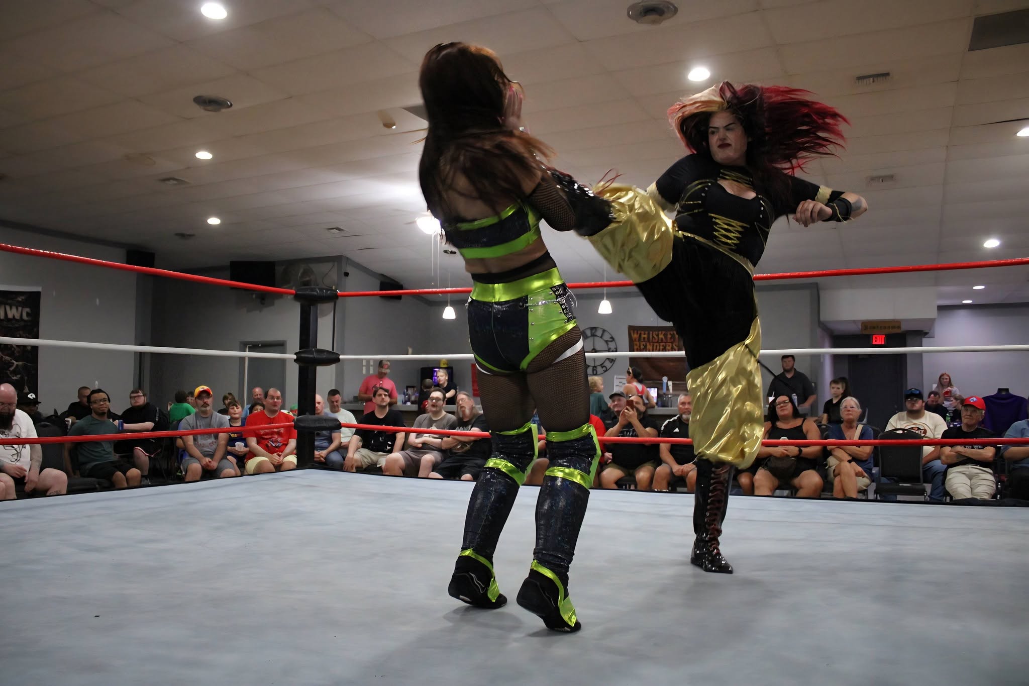 A kick lands during the MWC Women's Championship match