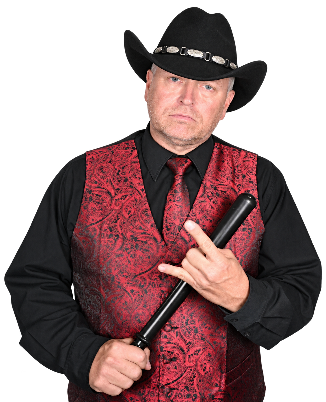 Billy Dutton in a black cowboy hat and red paisley vest holding a baton