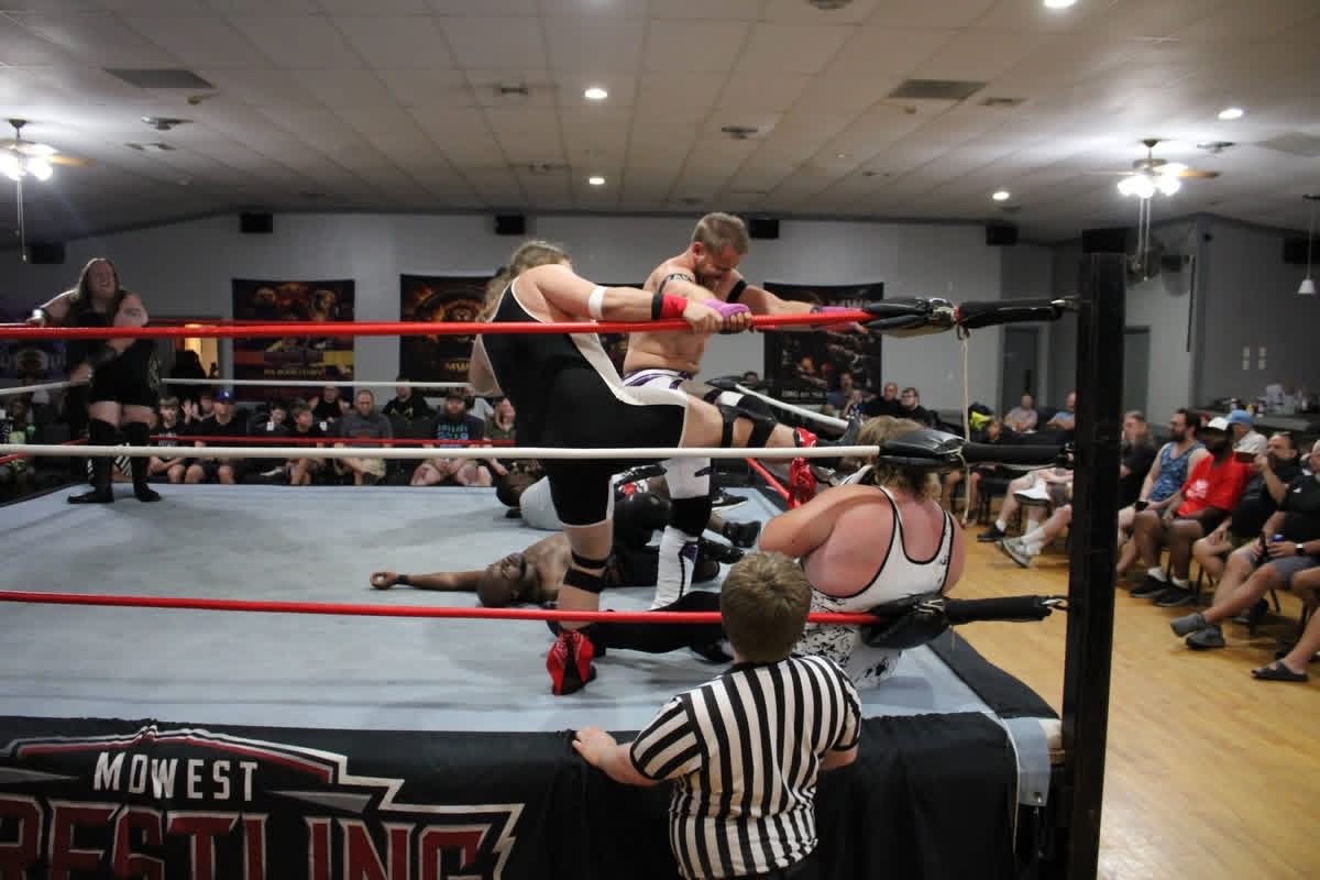 The Apex with purple hand tape in the ring near the ropes during MWC action